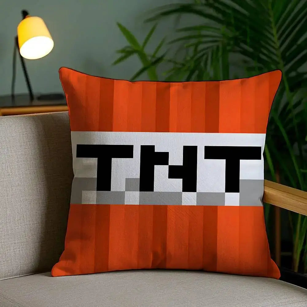 Pillow cover with TNT block design in orange stripes and white band with black TNT letters, short plush fabric.