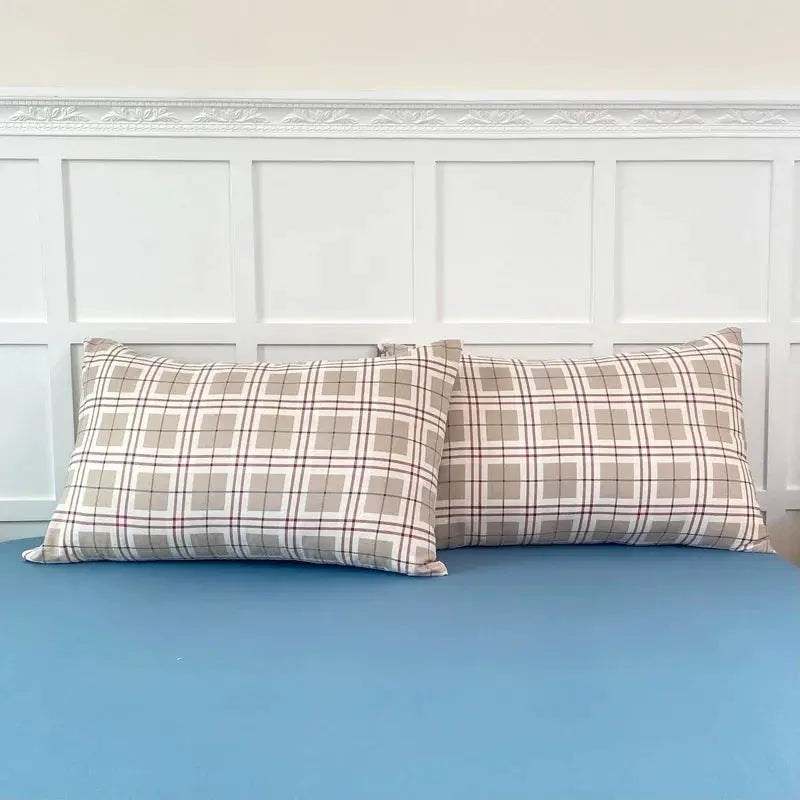 2PCS plaid pillowcase set from Simples Market for bedroom on blue bed, soft beige-brown fabric; insert not included