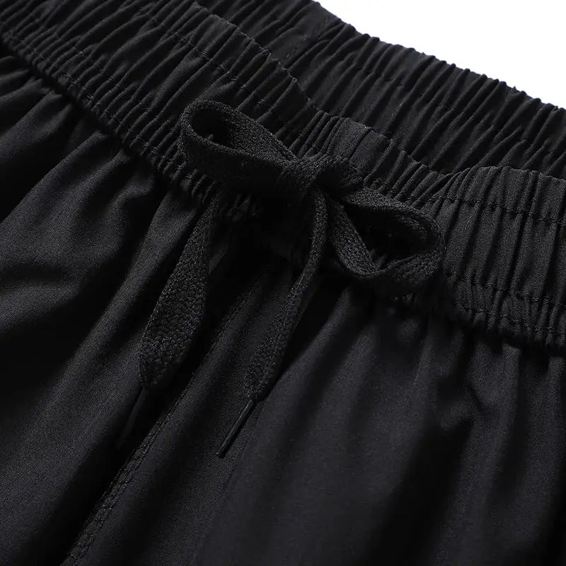 Men's quick-dry jogging shorts by Simples Market, black lightweight breathable with drawstring waist