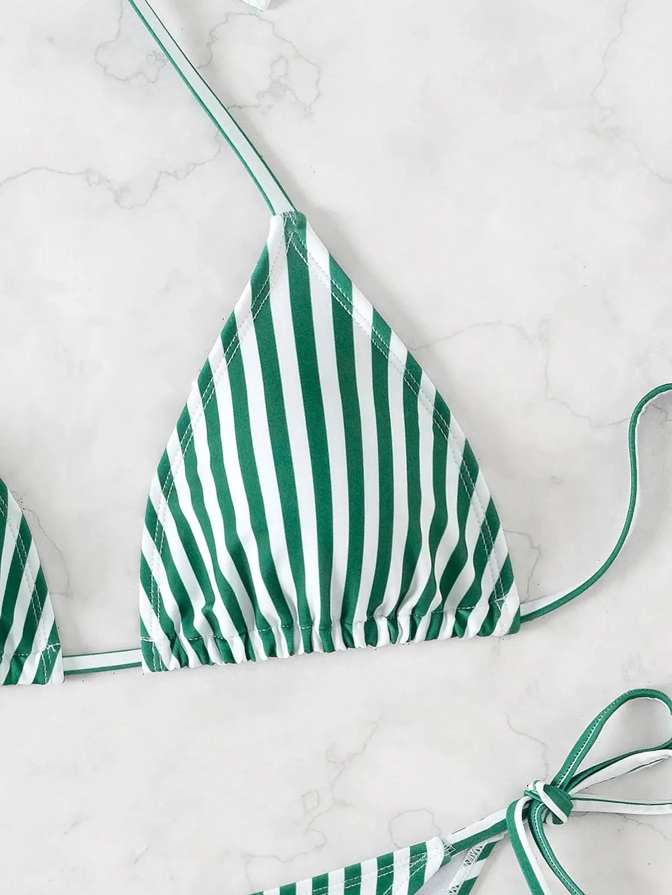 Triangle bikini top by Simples Market in green and white stripes with adjustable ties.