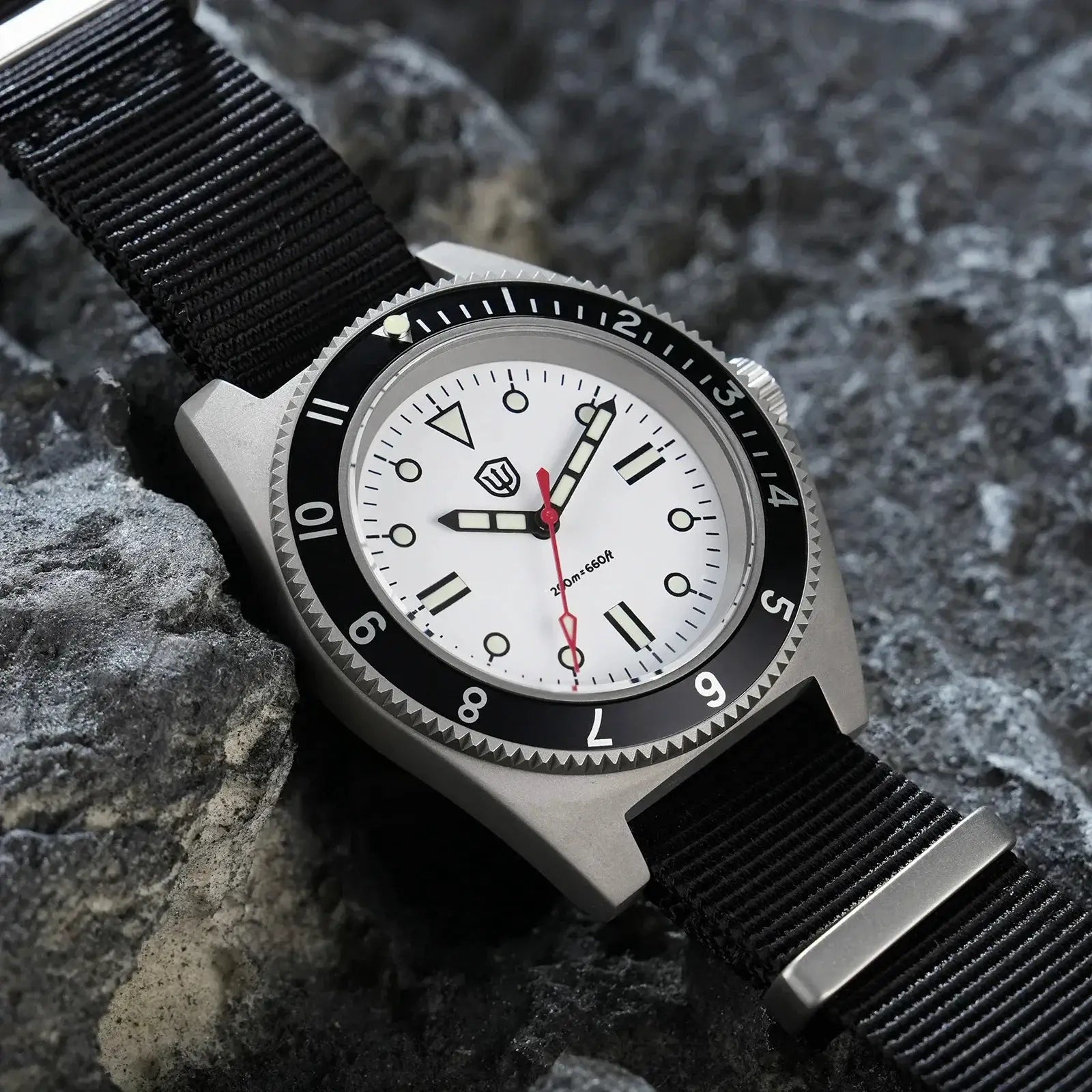 Watchdives WD1972 wristwatch with white dial, black bezel, and black nylon strap