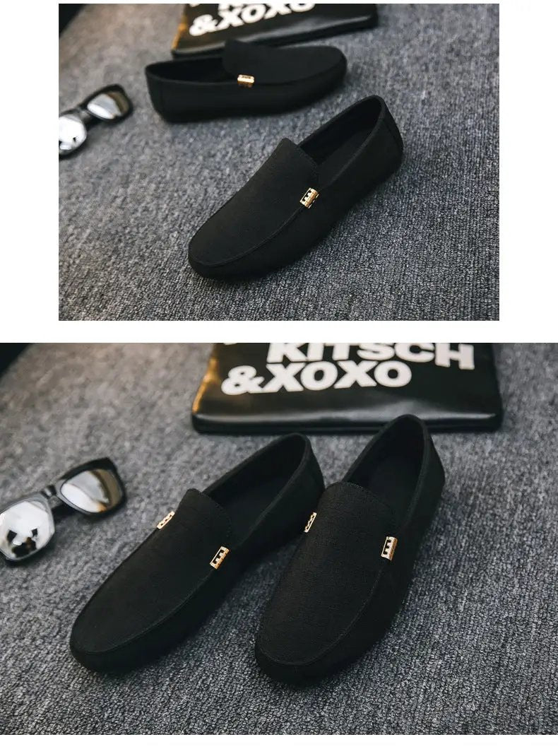Pair of men's black canvas slip-on loafers, casual fashion footwear
