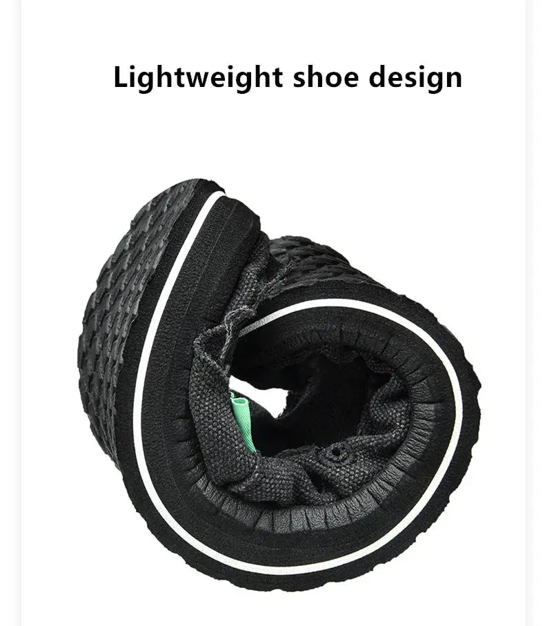 Men's black canvas casual sneakers, lightweight breathable low-top design.