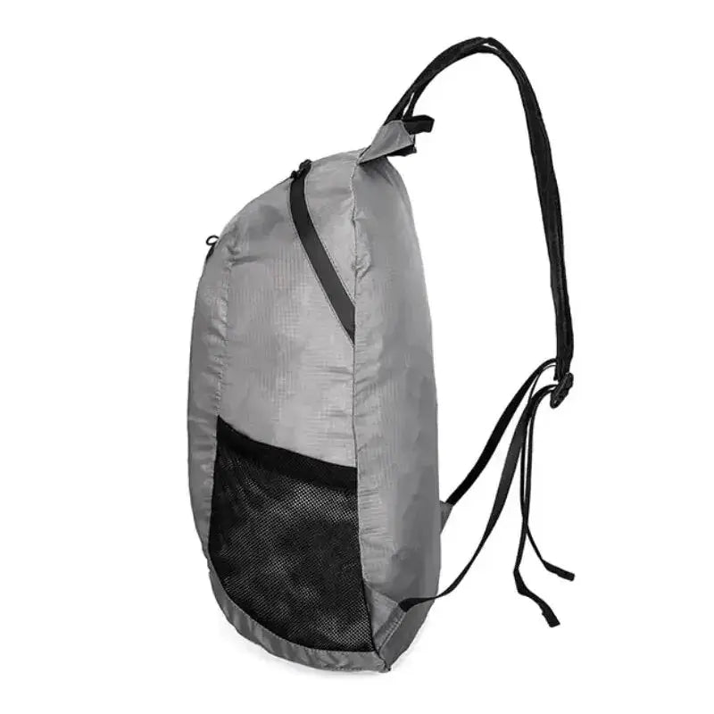 Foldable 20L hiking backpack in gray, ultralight and compact design perfect for outdoor adventures.
