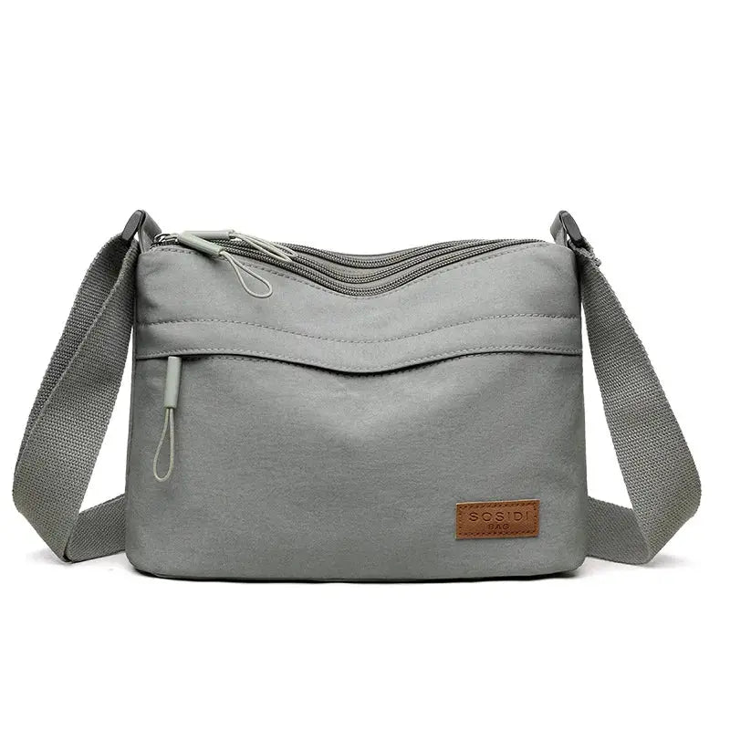 Simples Market gray canvas crossbody bag with 3 pockets and adjustable strap