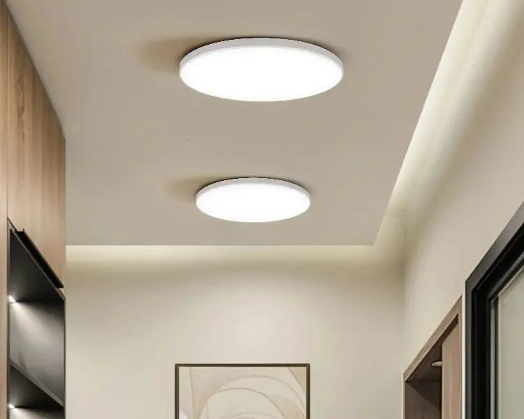 Radar ceiling light with motion sensor; two round white LED flush-mounts in hallway.