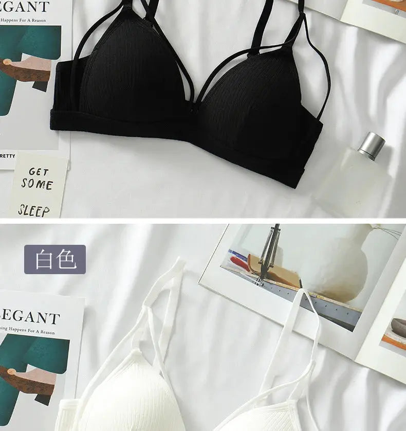 Black and white wire-free triangle-cup bralettes on bed (2 items)