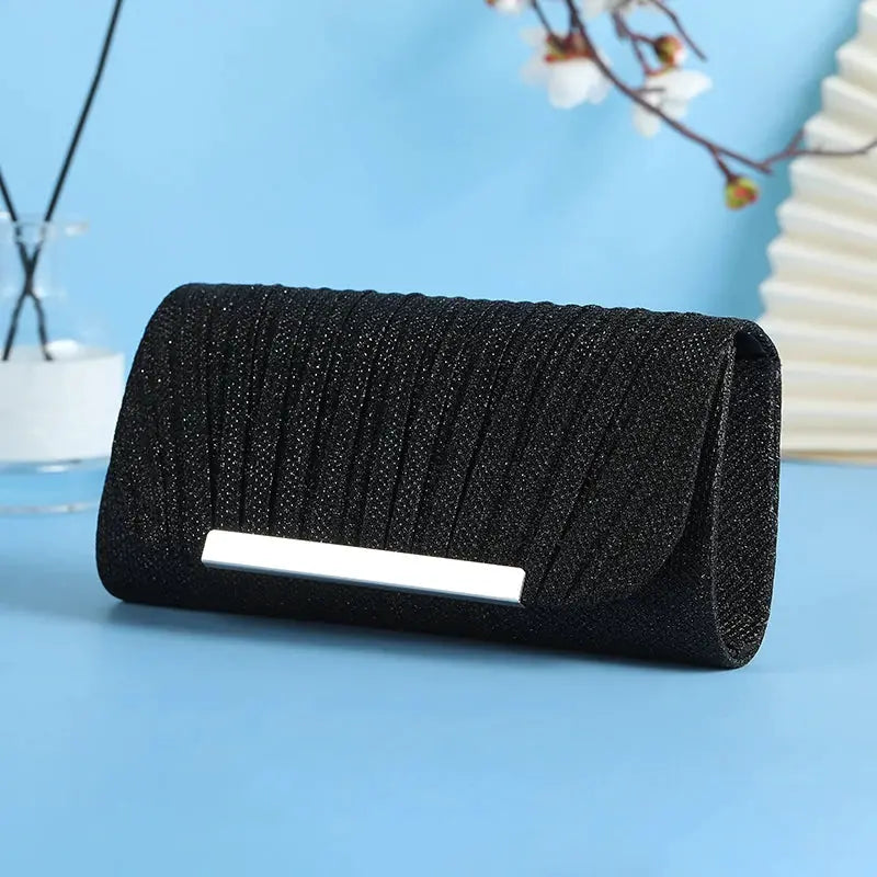 Simples Market black sequined clutch bag with silver bar clasp
