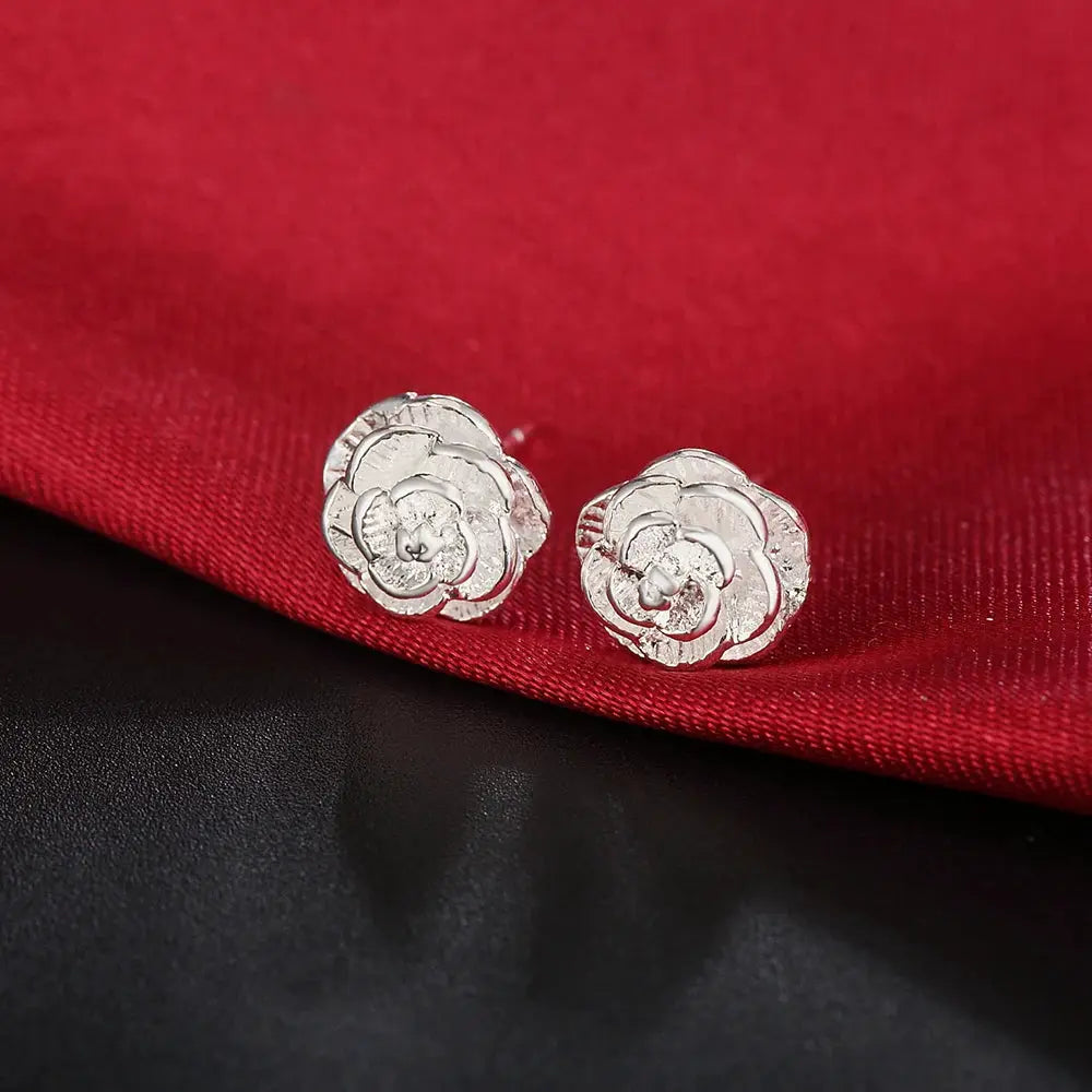 Pair of 10mm 925 sterling silver flower stud earrings by Simples Market