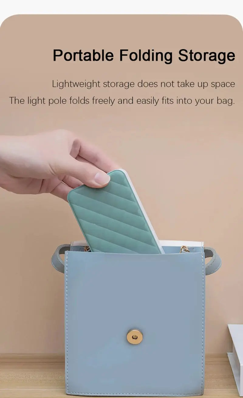 Simples Market folding LED desk lamp, teal color, rechargeable battery, portable.