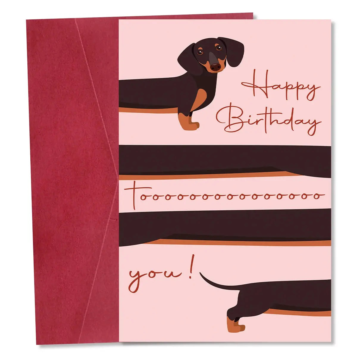 Whimsical dachshund birthday greeting card with envelope; pink card shows dachshund illustration and Happy Birthday