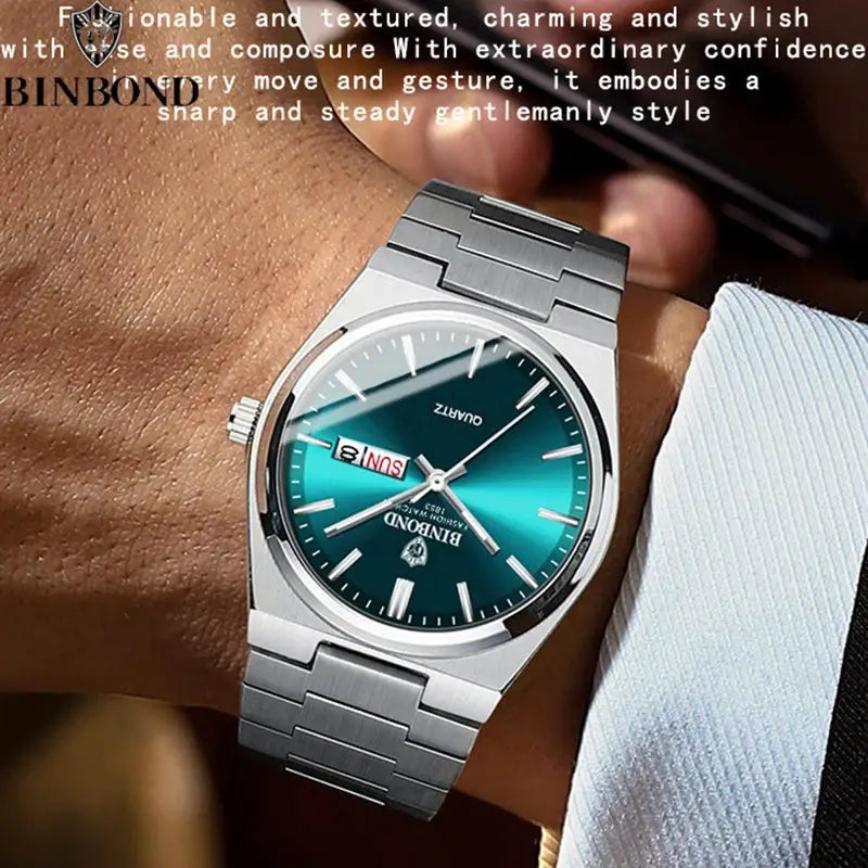 BINBOND men's stainless steel watch with teal dial and day-date window.