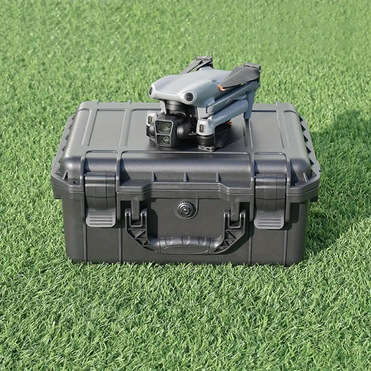 Waterproof hard carry case gray plastic tool box with pre-cut sponge storage on grass