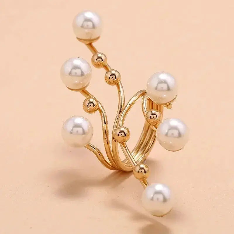 Ring set: gold-tone pearl-branch design with irregular three-layer bands and white pearl beads by Simples Market