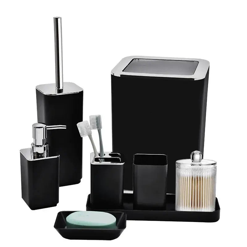 8-piece black bathroom storage set with chrome, includes toilet brush, soap dispenser, toothbrush cup and trash can.