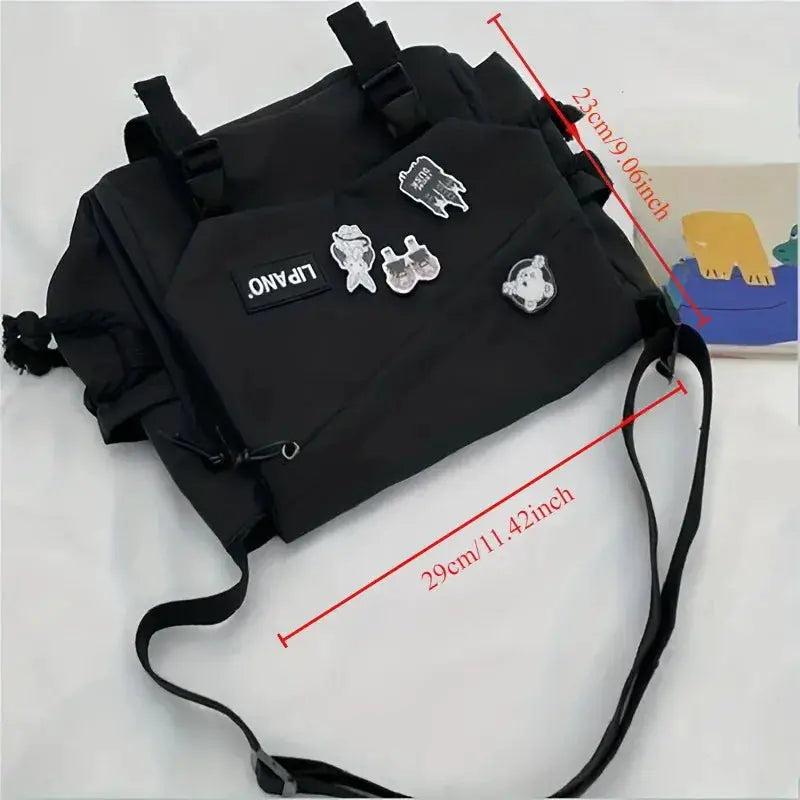 Black nylon crossbody messenger bag with patches, large-capacity and adjustable strap.