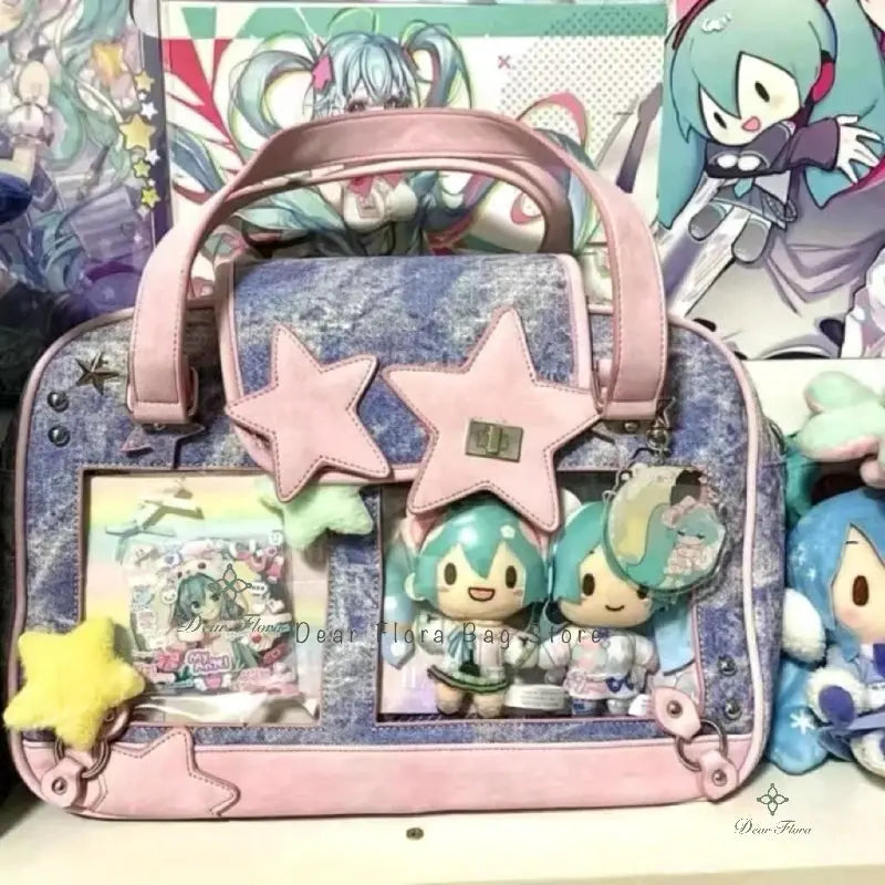Y2K Star Ita Bag by Simples Market, denim blue bag with pink star patches and clear pockets