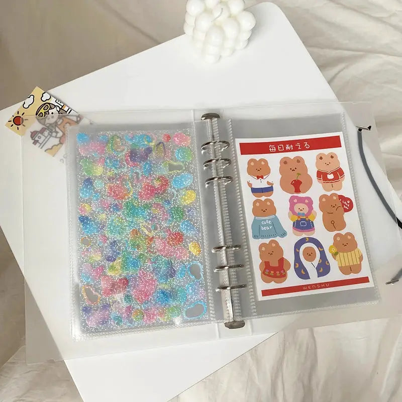 Yoofun A5 binder with clear storage sleeves and card holder, featuring colorful glittery stickers across both sides
