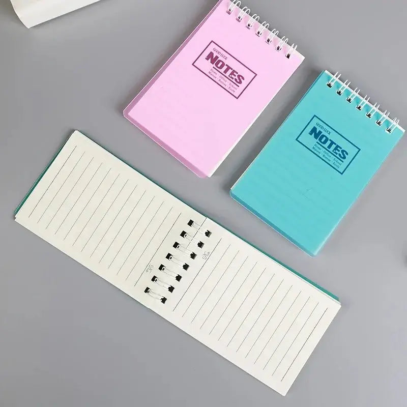 10-piece mixed color mini note pad set; pocket-sized spiral notebooks in pink, blue and mint with lined pages