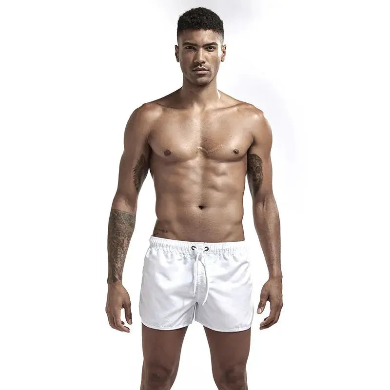 Men's white quick-dry board shorts with drawstring