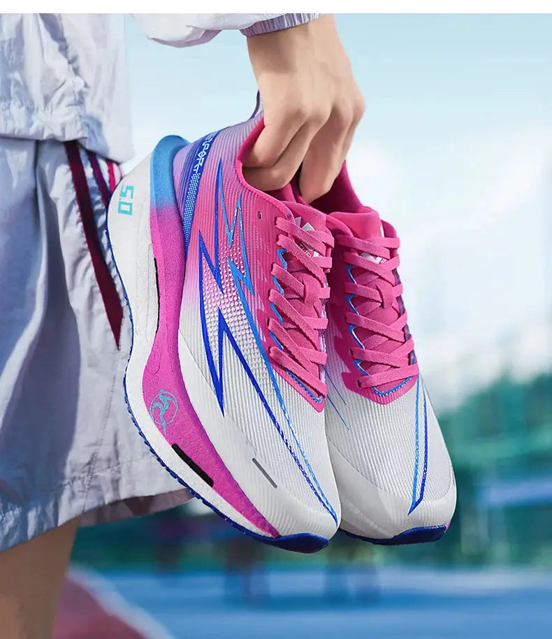 Running shoes by Simples Market, pink and white with blue accents and breathable mesh