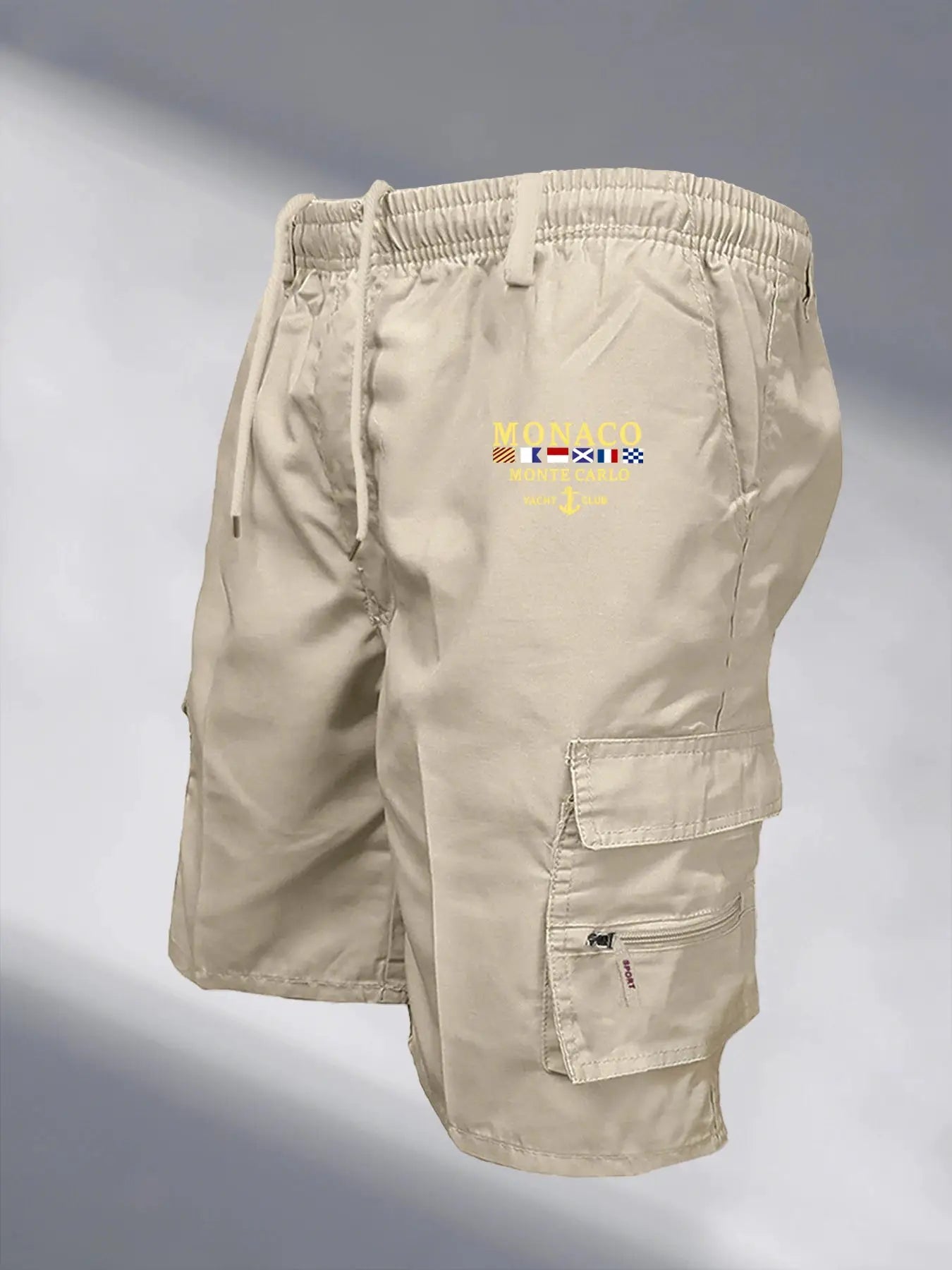 Men's beige tactical cargo shorts with elastic waist, drawstring, side pocket and Monaco logo.