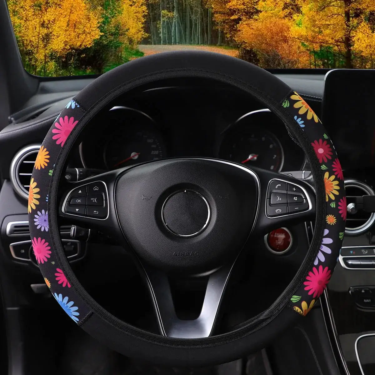 Steering wheel cover 38cm floral print on black fabric with pink, yellow and blue flowers for cars