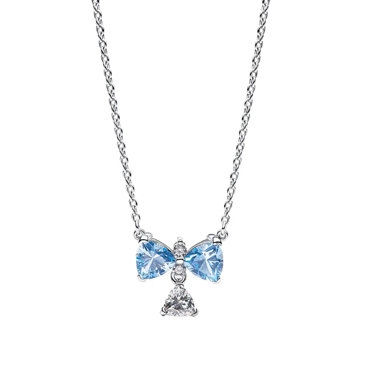 Pendant necklace with silver chain featuring a blue crystal bow and a dangling clear gemstone