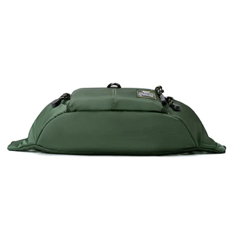 Simples Market green nylon men’s waist fanny pack with multiple pockets and belt sling design.