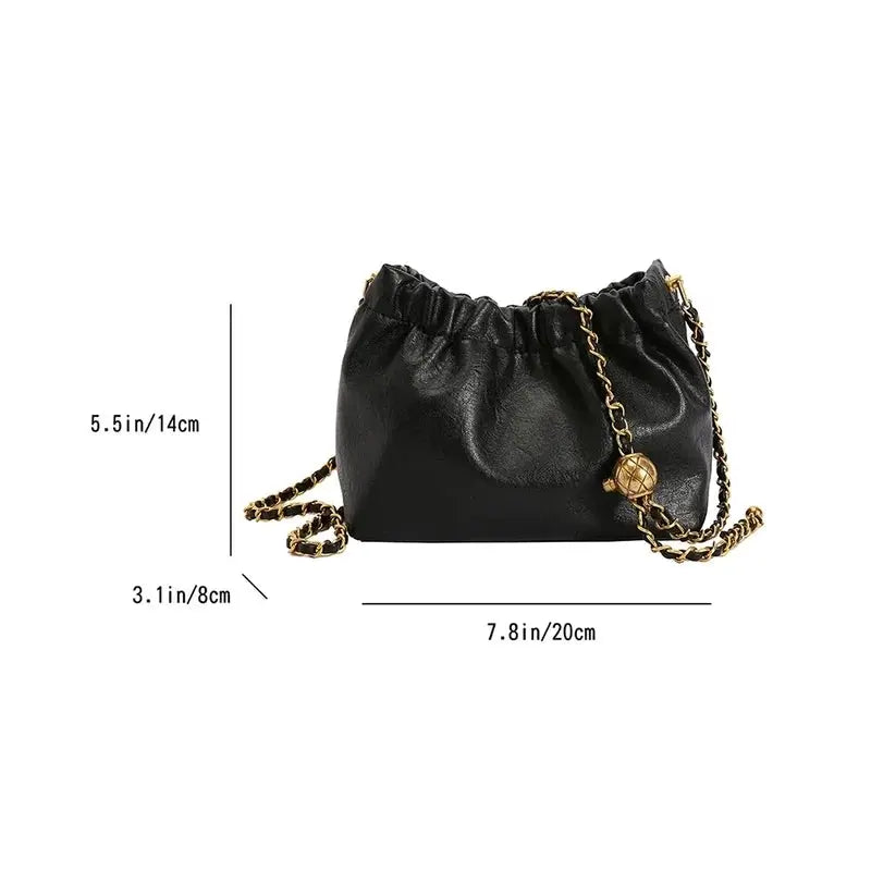 Women's black chain-strap shoulder bag with gold-tone chain, crossbody tote style, 7.8in x 5.5in x 3.1in (20x14x8 cm).