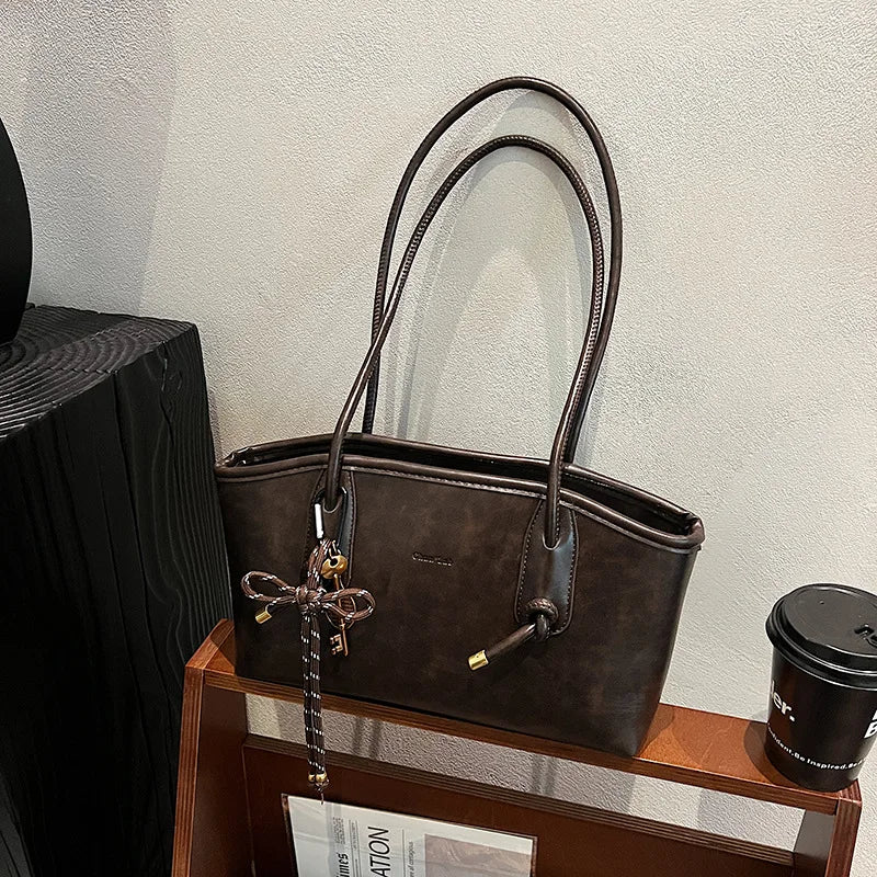 Women's PU leather shoulder bag by Simples Market, brown crossbody tote with double handles, retro Y2K style