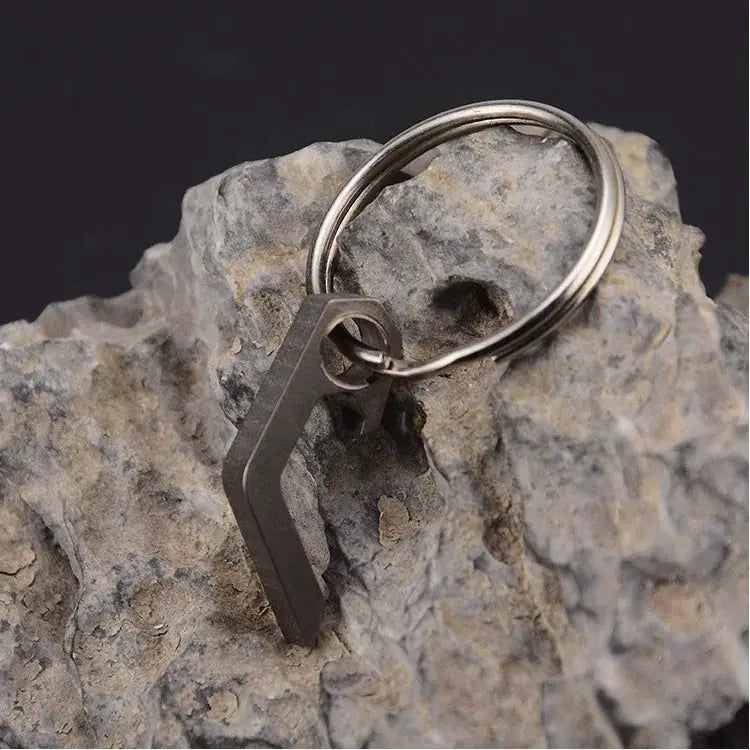 EDC mini bottle opener keyring in black metal on a silver ring