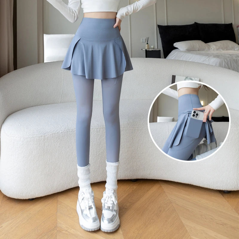 Women's blue-gray high-waist fake two-piece seamless leggings with skirt overlay and side pocket.