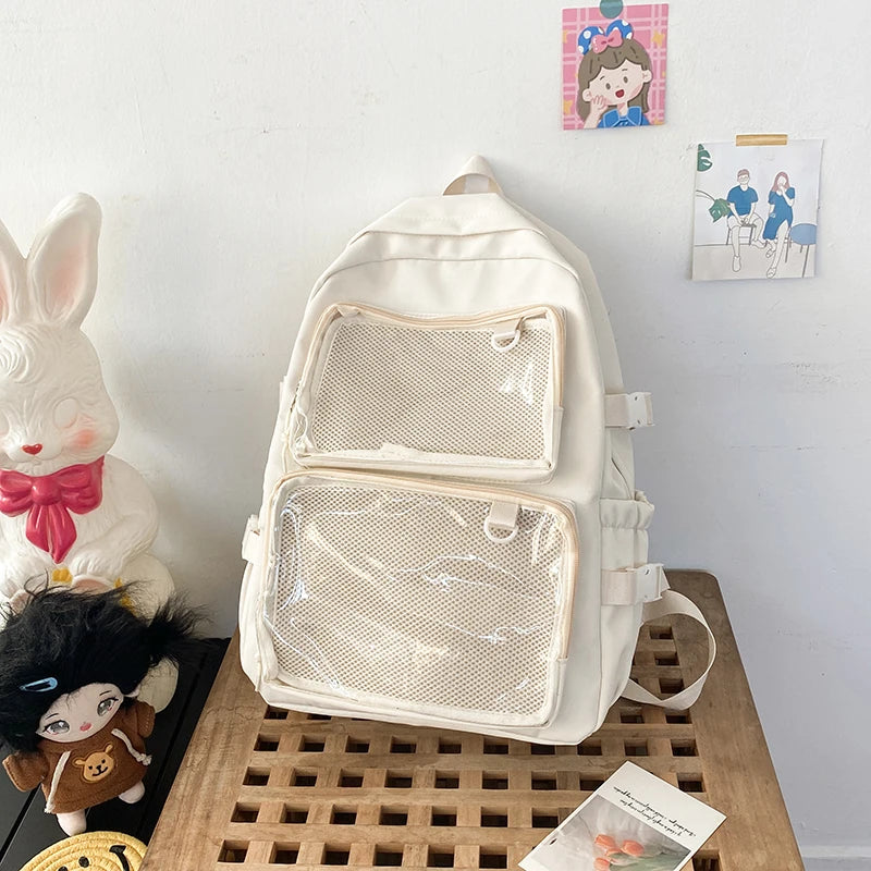 Japanese Style transparent Ita bag backpack in cream with two clear mesh front pockets.