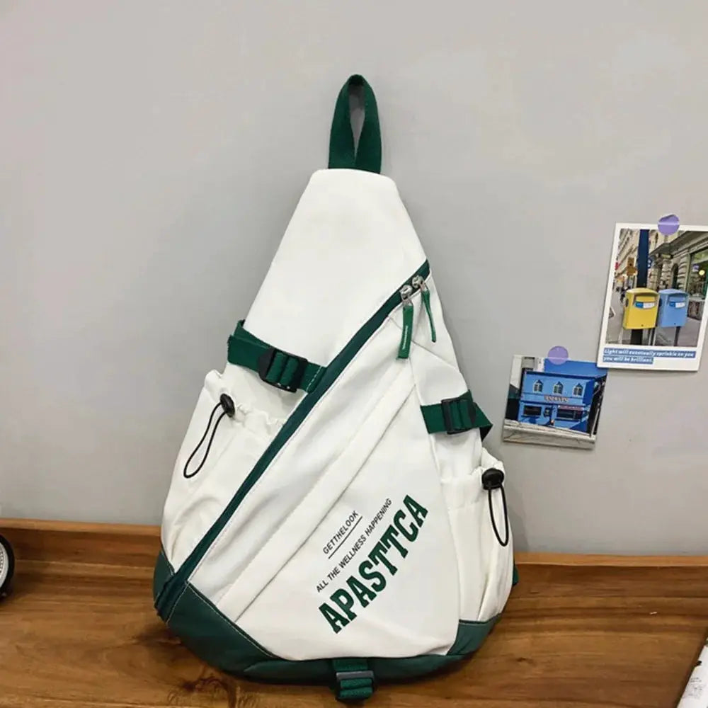 Crossbody bag, white nylon with green straps and zippers; unisex travel casual bag