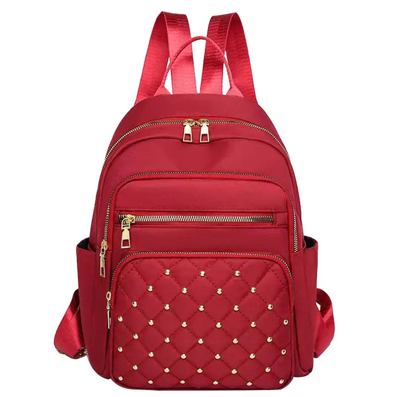 Simples Market travel backpack, red quilted exterior with gold-tone studs, double-shoulder straps, large-capacity