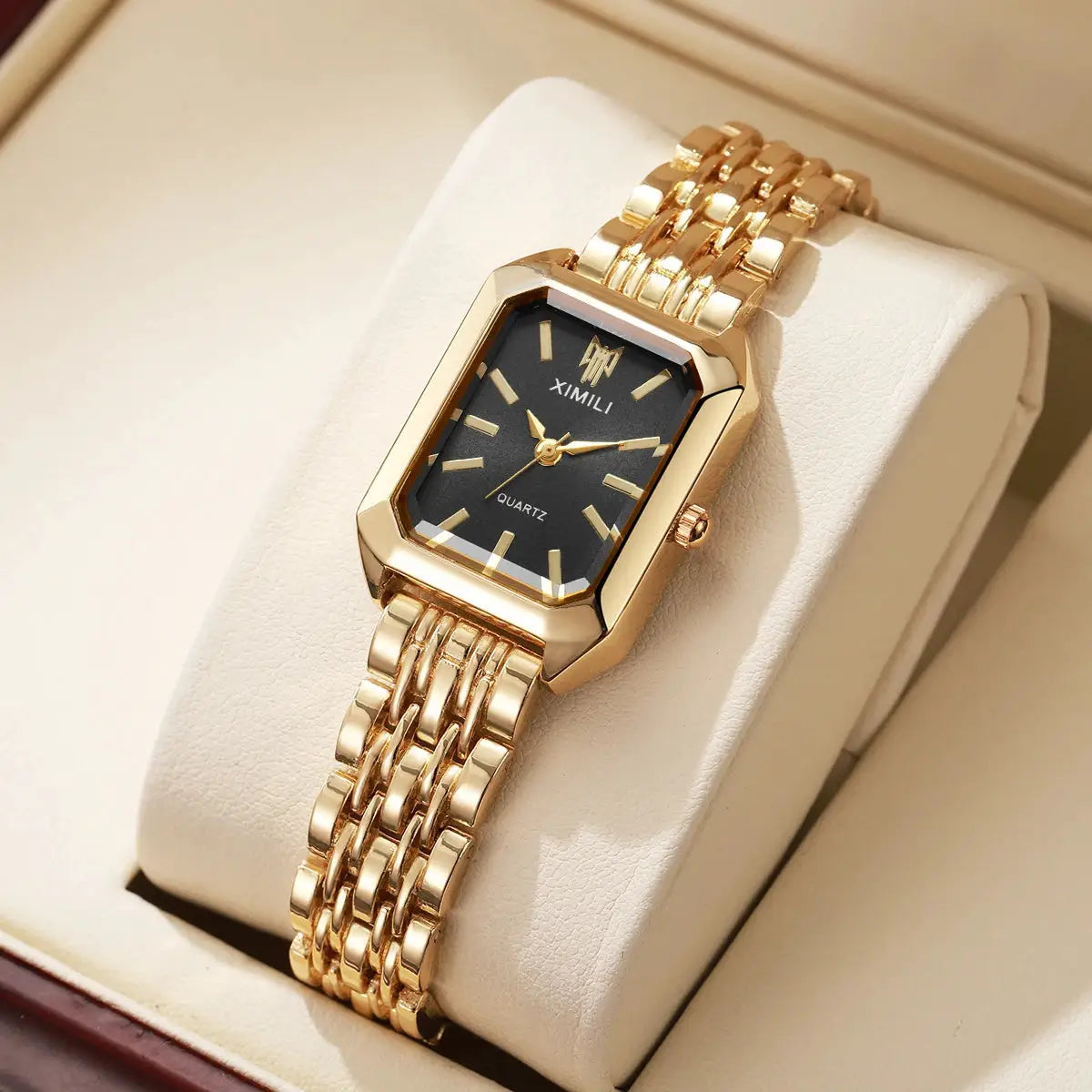 Gold-tone rectangular women's quartz watch with steel link band