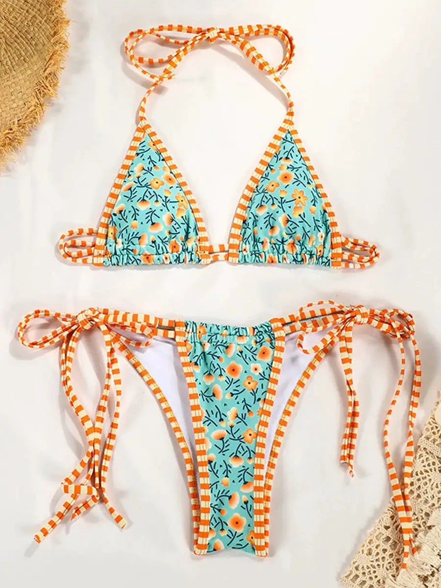 Two-piece turquoise floral bikini set with orange striped trim; triangle top and tie-side bottoms