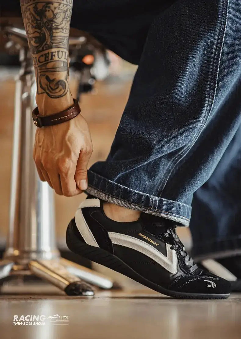 Maden Unisex Fall Vintage Patchwork Racing Shoes, black and white panels with a thin sole, lace-up.