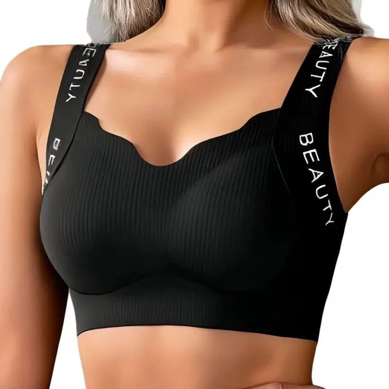 Ribbed push-up wireless bra by Simples Market, black seamless underwear with wide straps featuring BEAUTY branding.