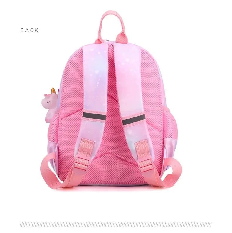 Unicorn backpack for girls by Simples Market, pink pastel with unicorn charm and pink padded straps