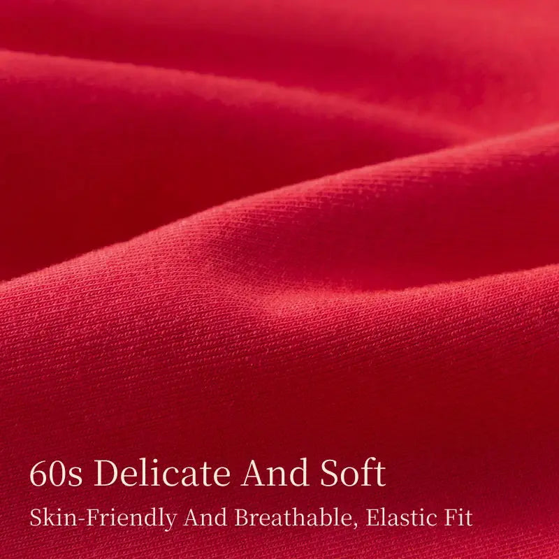 Women's seamless underwear fabric in red, close-up of soft, stretchy material.