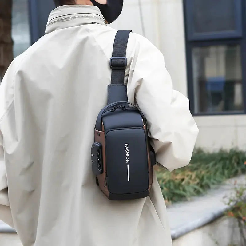 Men's anti-theft chest bag crossbody with USB charging, black front panel and brown sides.
