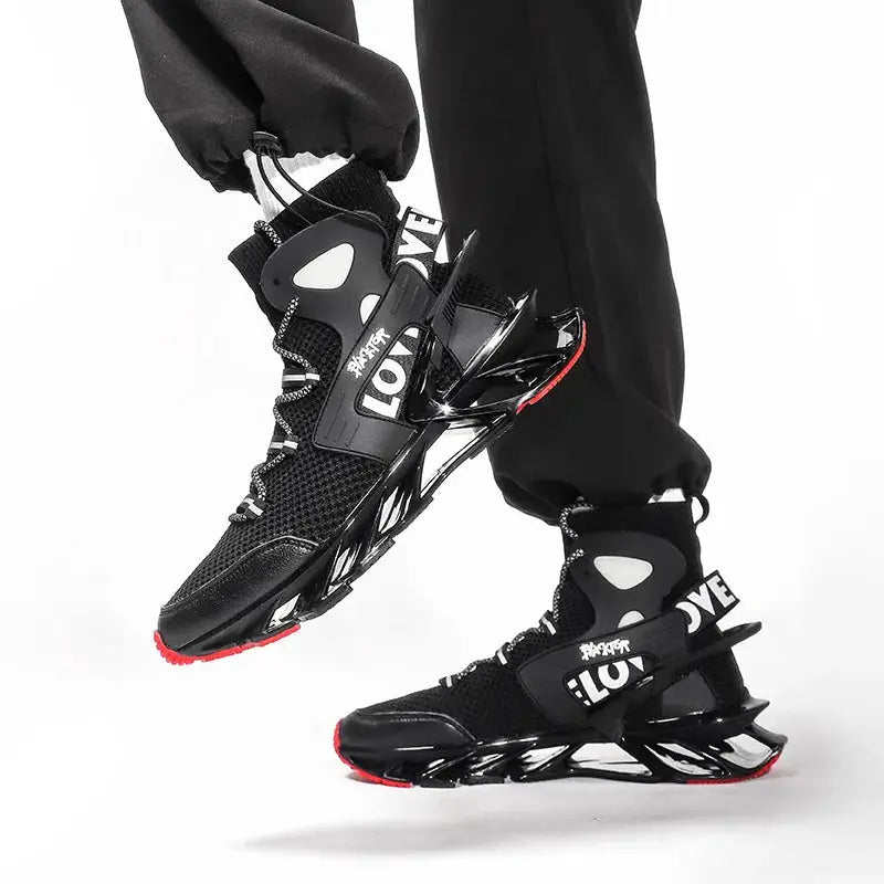 Pair of men's black mesh sneakers with strap overlays and angular sculpted sole with red outsole