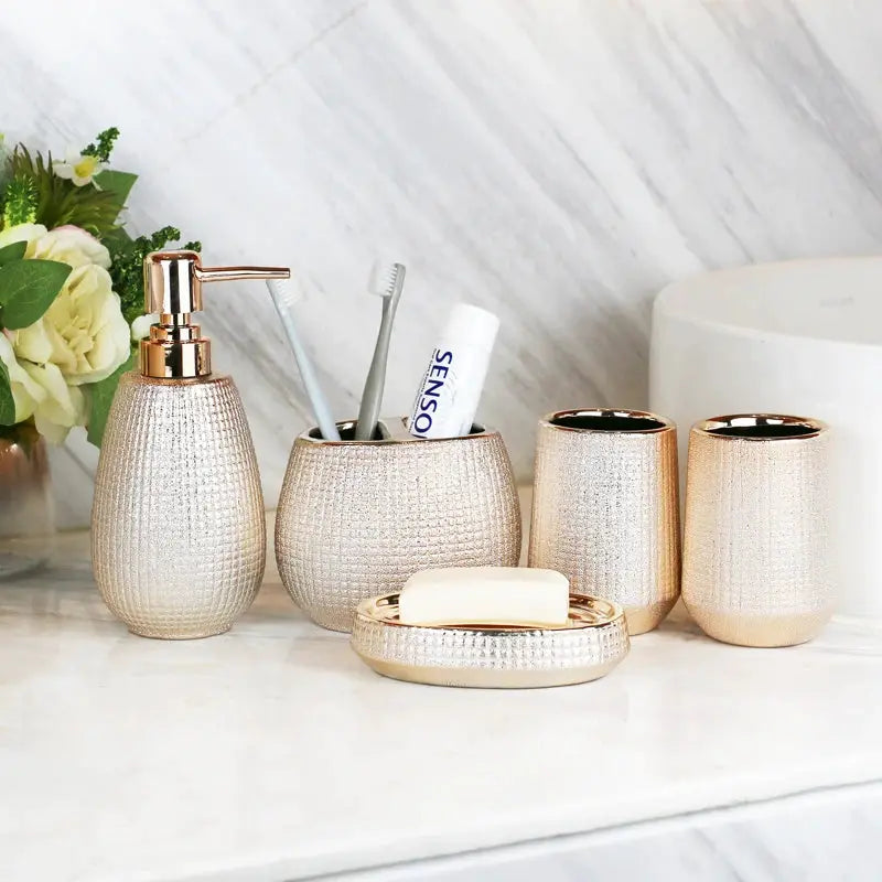 Simples Market rose-gold ceramic bathroom accessories set with soap dispenser, toothbrush holder, two cups, and soap dish