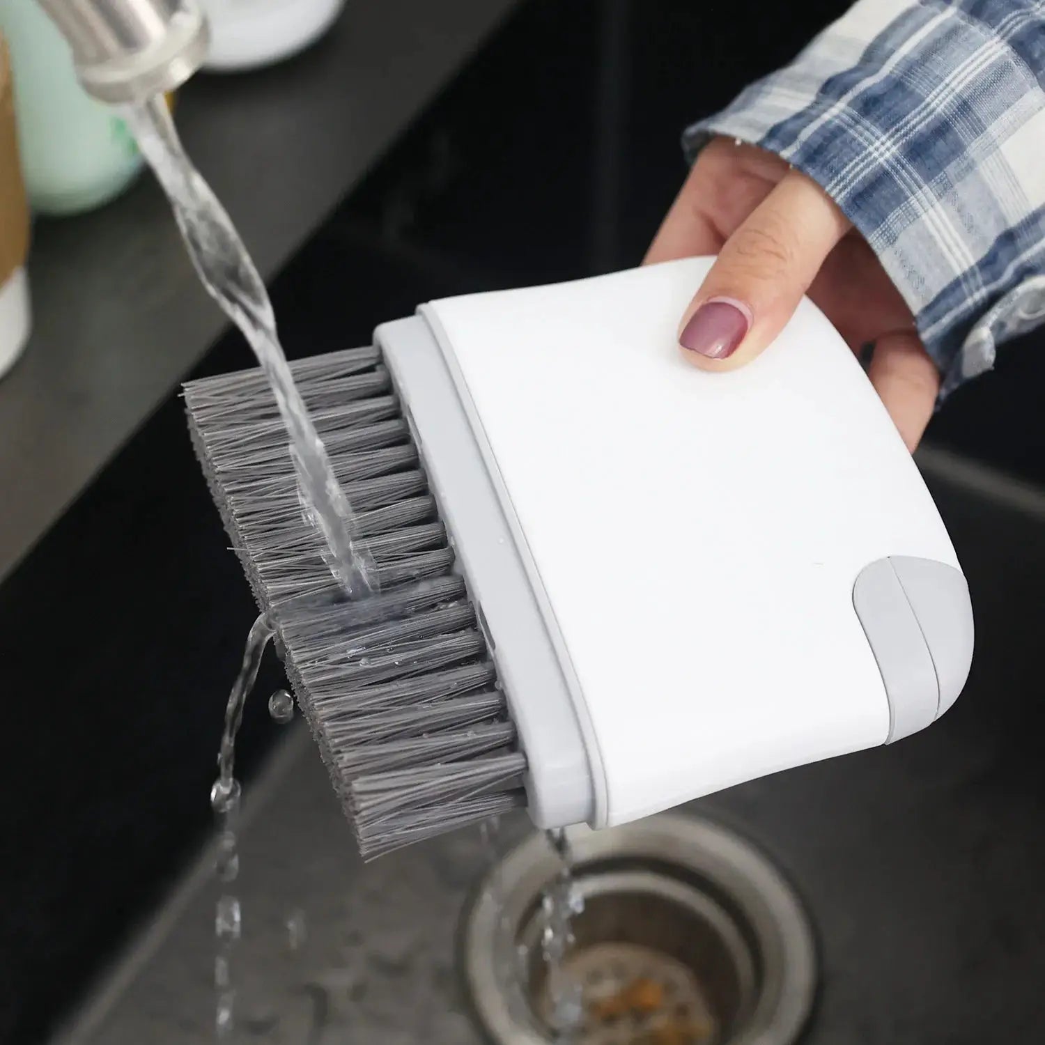 2-in-1 window rail cleaning brush by Simples Market, white plastic body with grey bristles