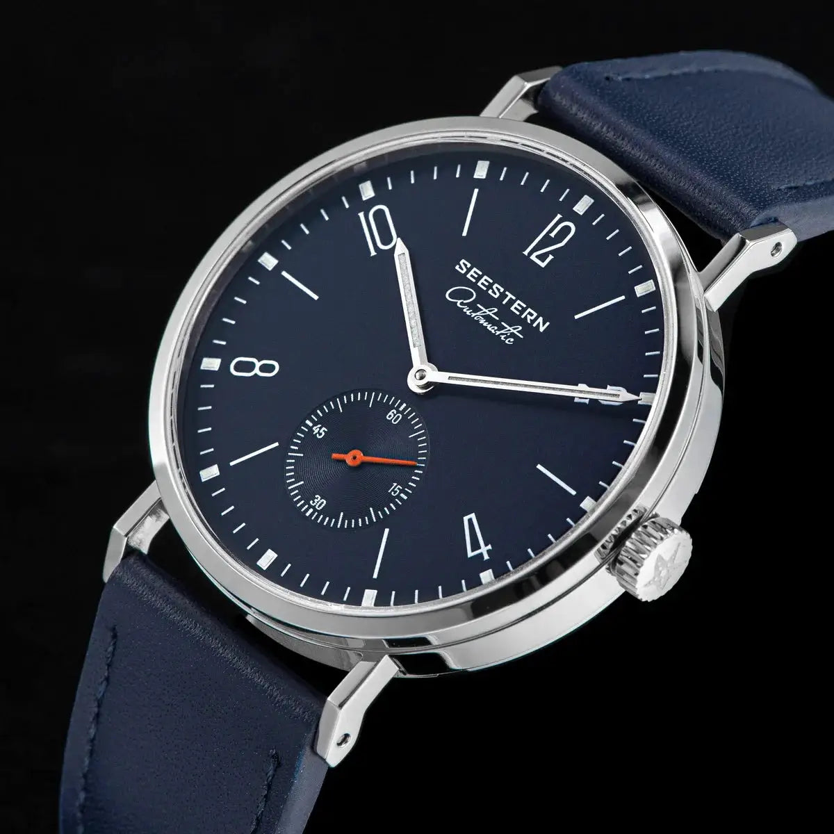 SEESTERN men’s automatic wristwatch with navy dial, stainless steel case and blue leather strap.