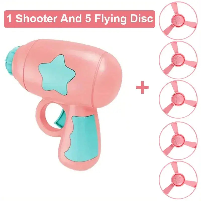 Funny cat toy interactive launch gun; pink handheld training toy with turquoise star and grip, plus 5 flying discs.