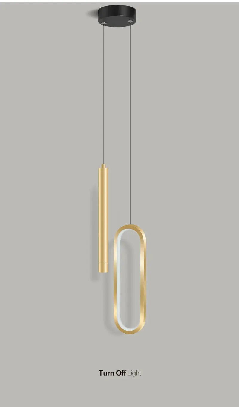 Nordic LED pendant light with gold oval ring and cylindrical pendant for modern interiors.