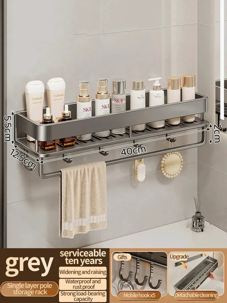 Aluminum wall-mounted kitchen rack with two-tier shelf and hooks, silver metal holding bottles on top and a towel below